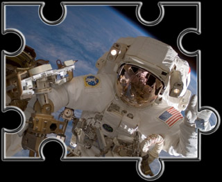 ISS-Astronaut bei Weltraumspaziergang ISS-Astronaut bei Weltraumspaziergang